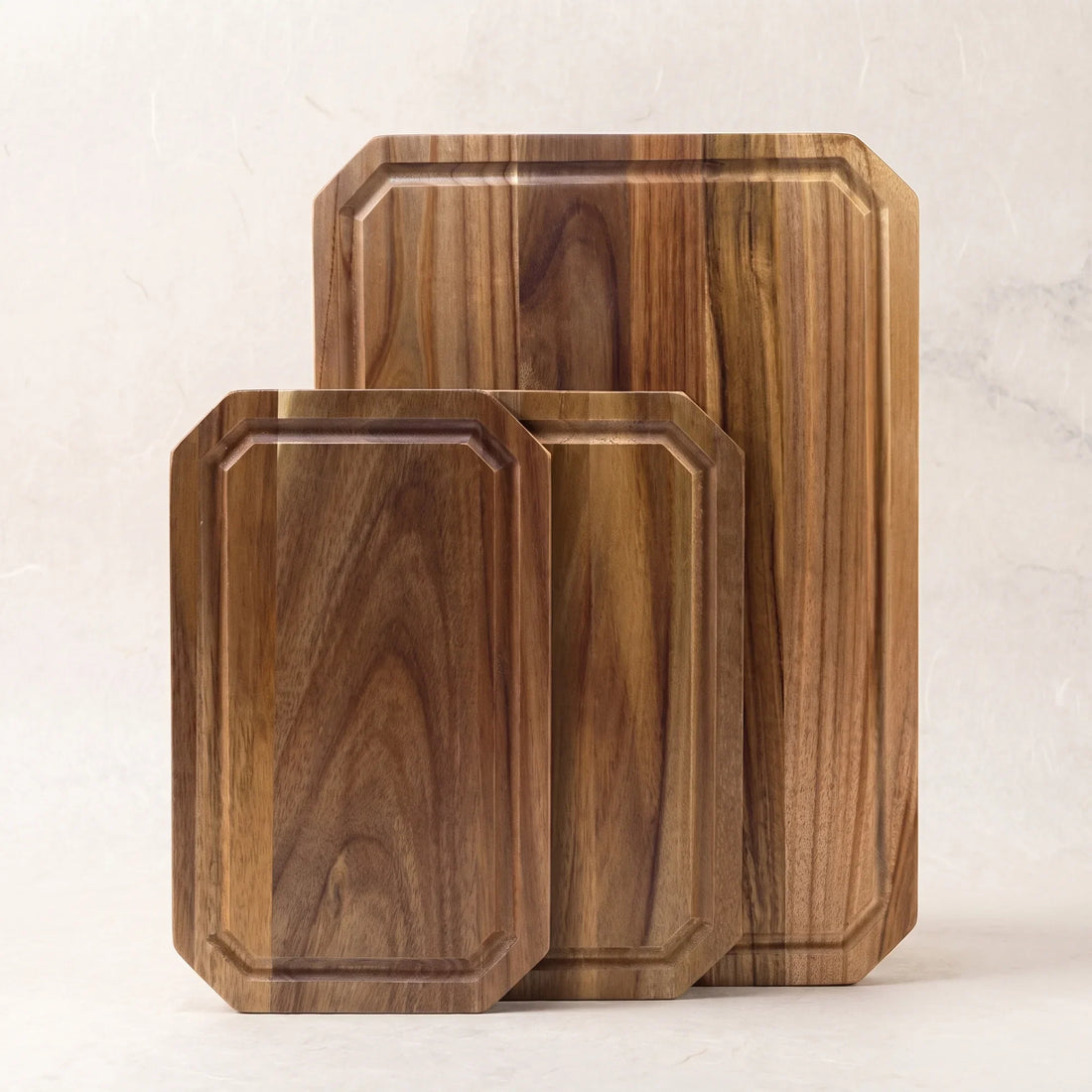 Set of three acacia wood cutting boards