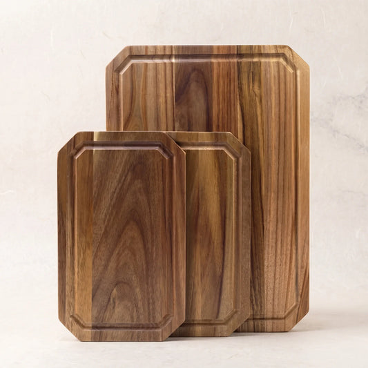 Set of three acacia wood cutting boards
