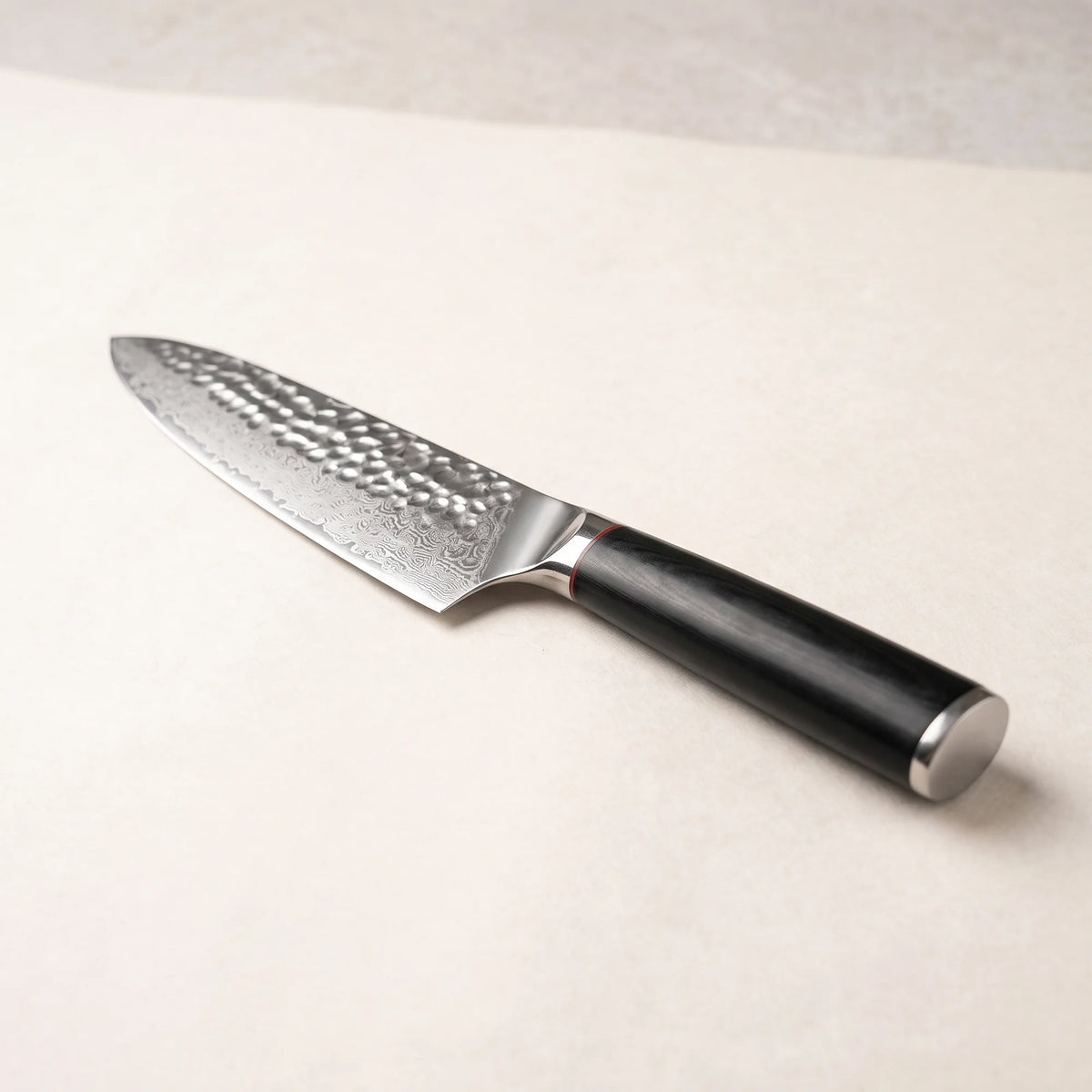 Hammered Chef Knife 7" – Hochodo, three-quarter view